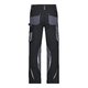 Schwarz-graue Arbeits-Hose aus Polyester und Baumwolle mit mehreren Taschen.